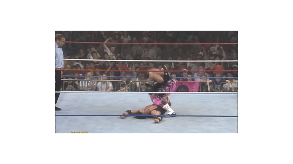 Bret Hart transitioning into offense during the later stages of the match.